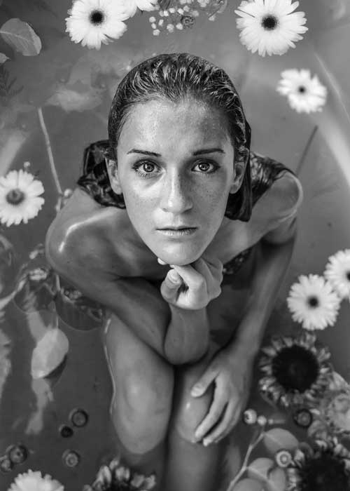 women in flowerfull bath deep relax photo by genessa-panainte